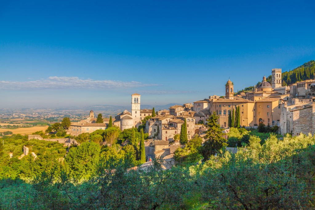 Historic town of Assisi at sunrise, Umbria, Italy